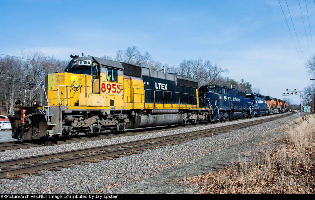 LTEX 8955 leads the Empty Grain Train west through Shirley 